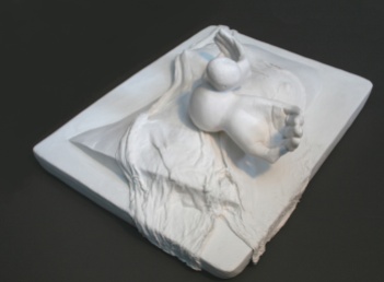 Plaster relief sculpture