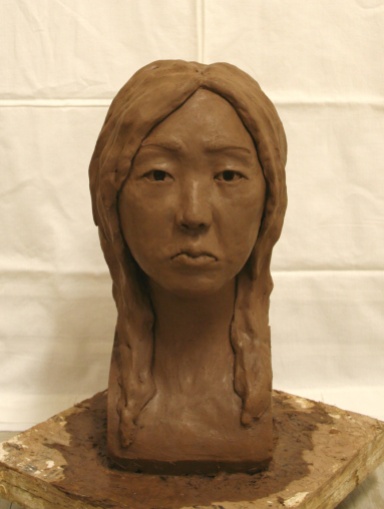 Front view of the initial clay sculpture