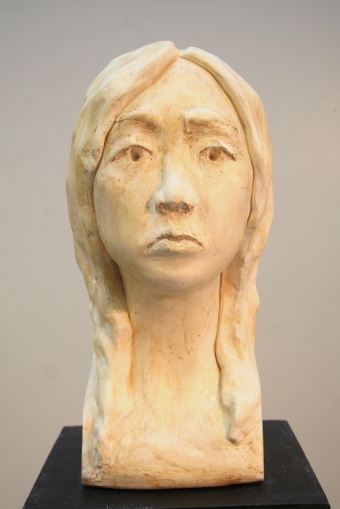 Front view of final plaster bust