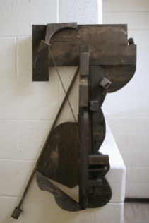 a wooden abstract sculpture