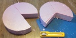 cutting pink foam into pie sized pieces